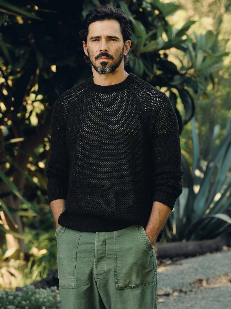 cascabel open weave sweater in black