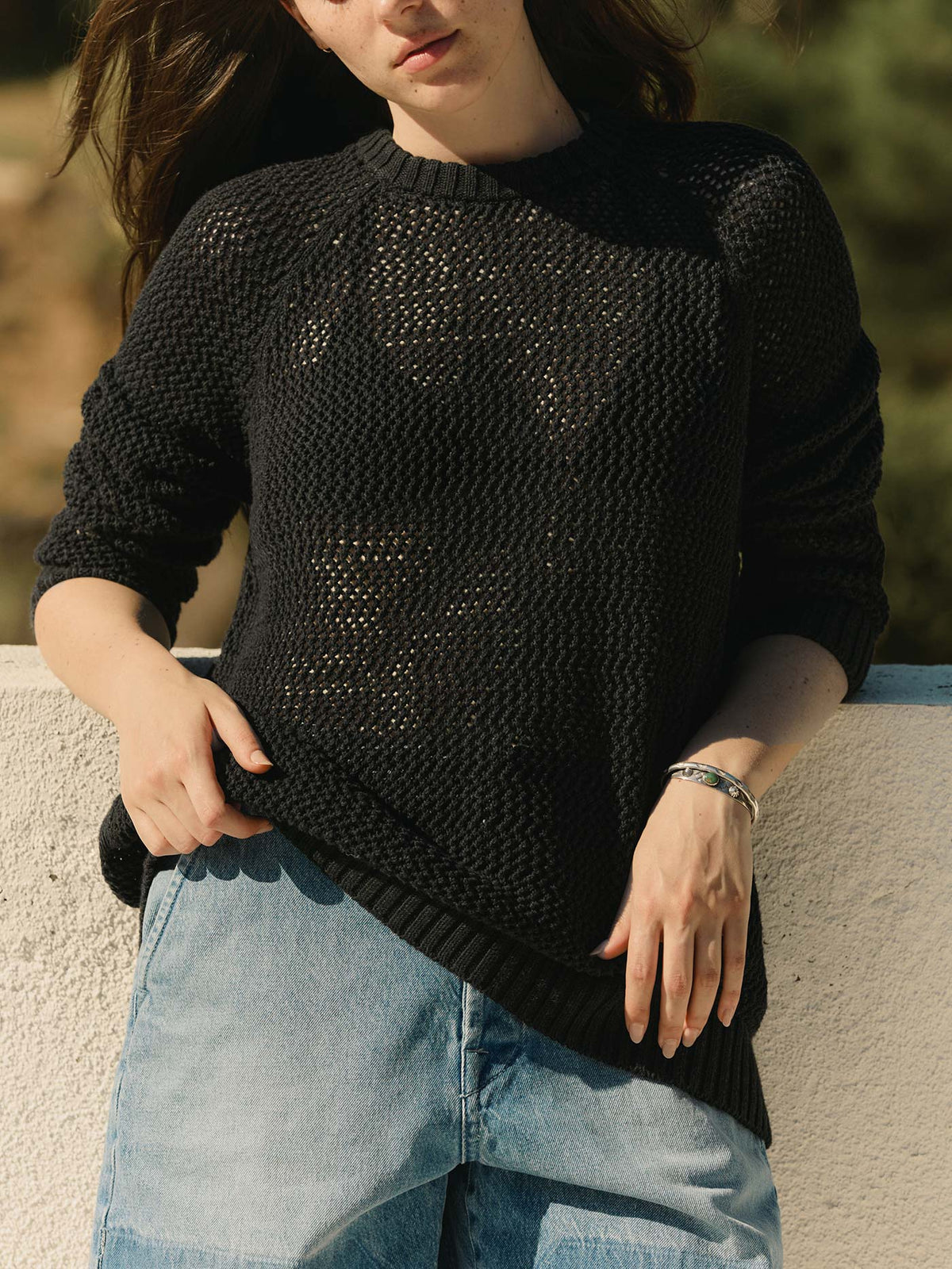 cascabel open weave sweater in black