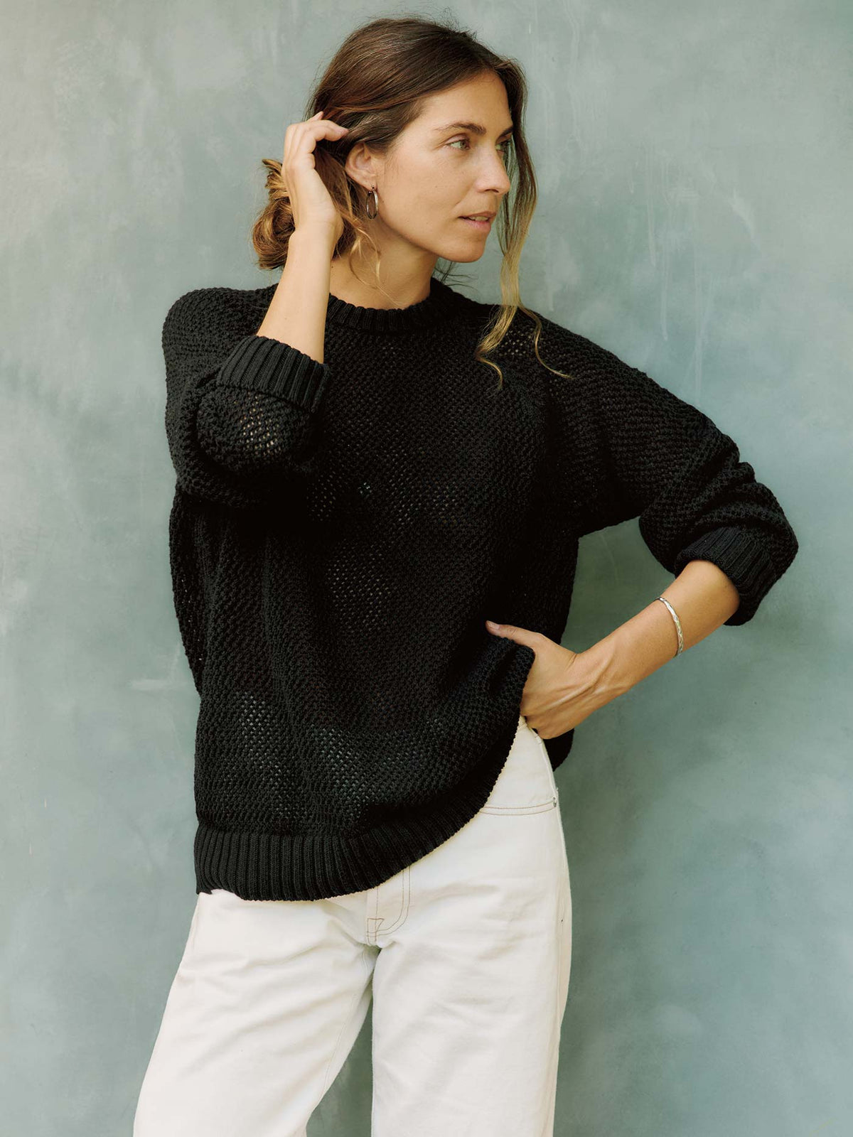 cascabel open weave sweater in black