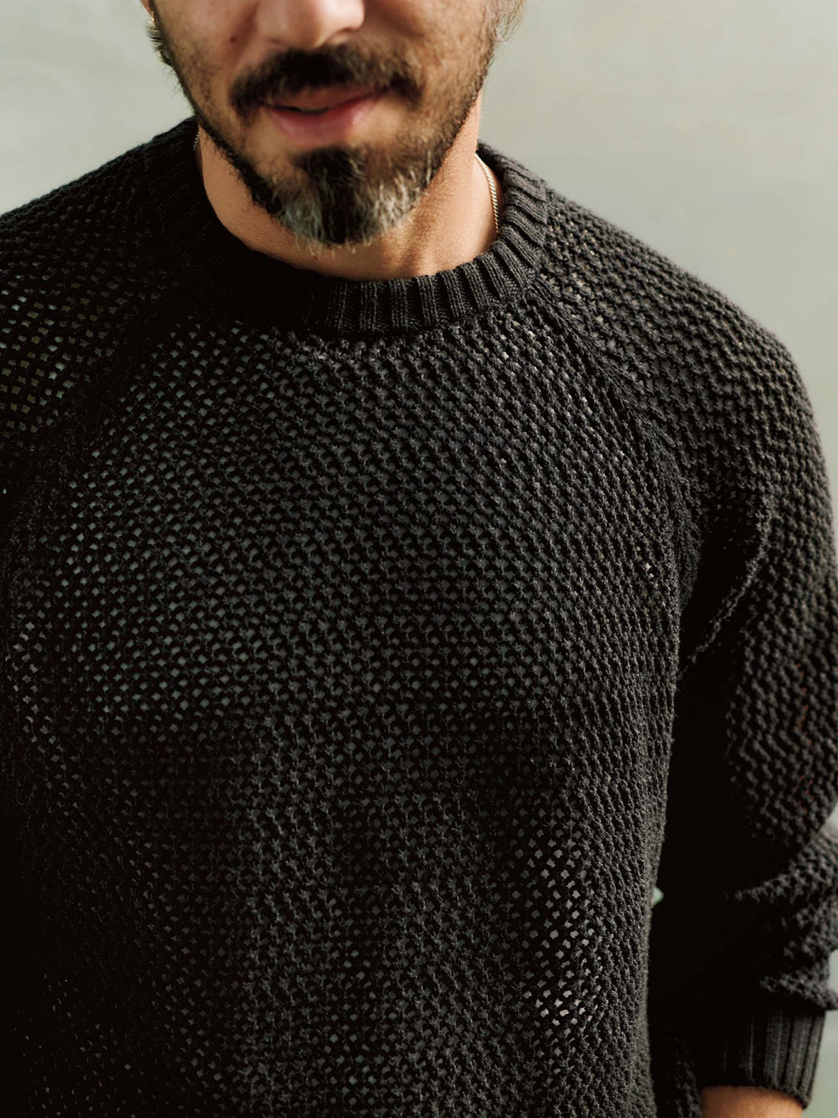 cascabel open weave sweater in black