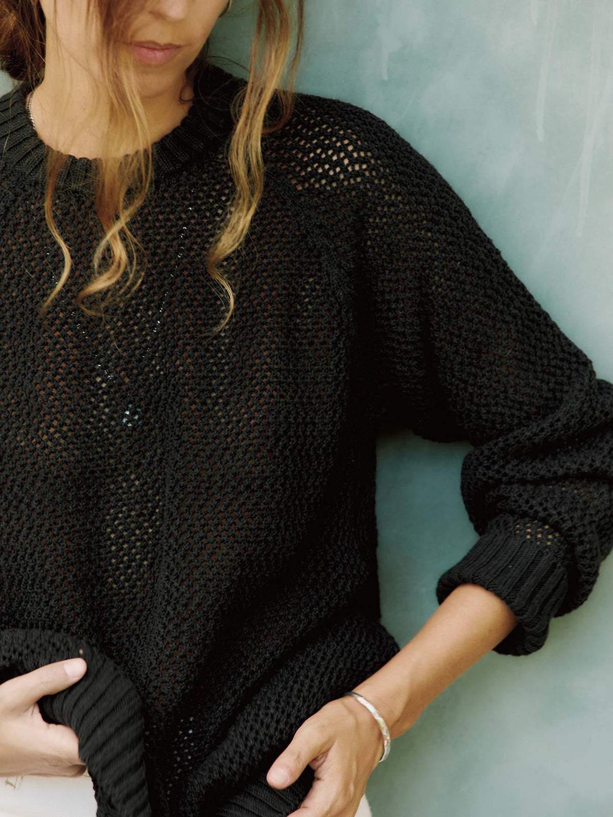 cascabel open weave sweater in black