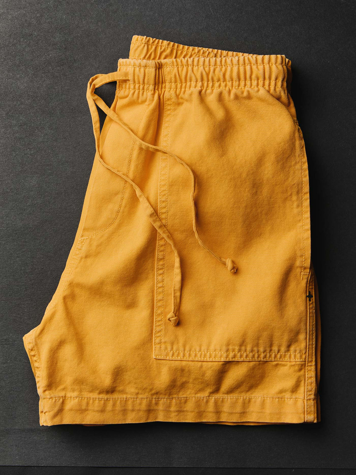 the canvas lounge short in marigold