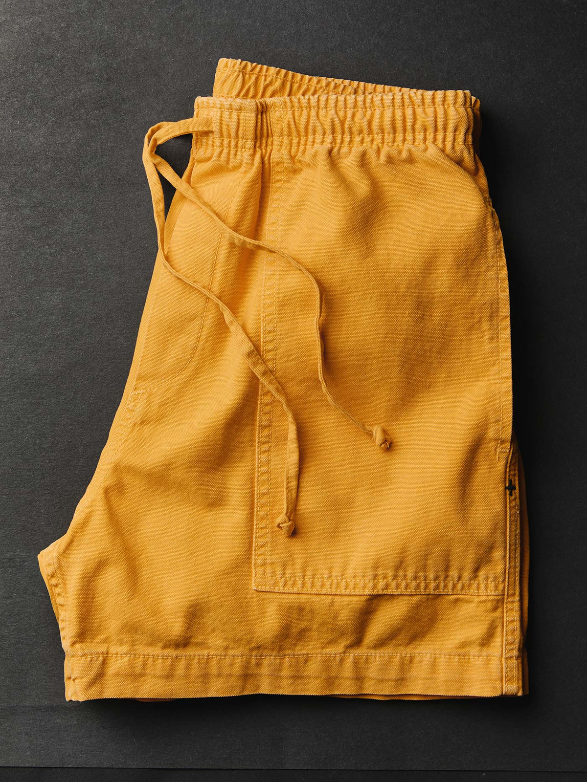 the canvas lounge short in marigold