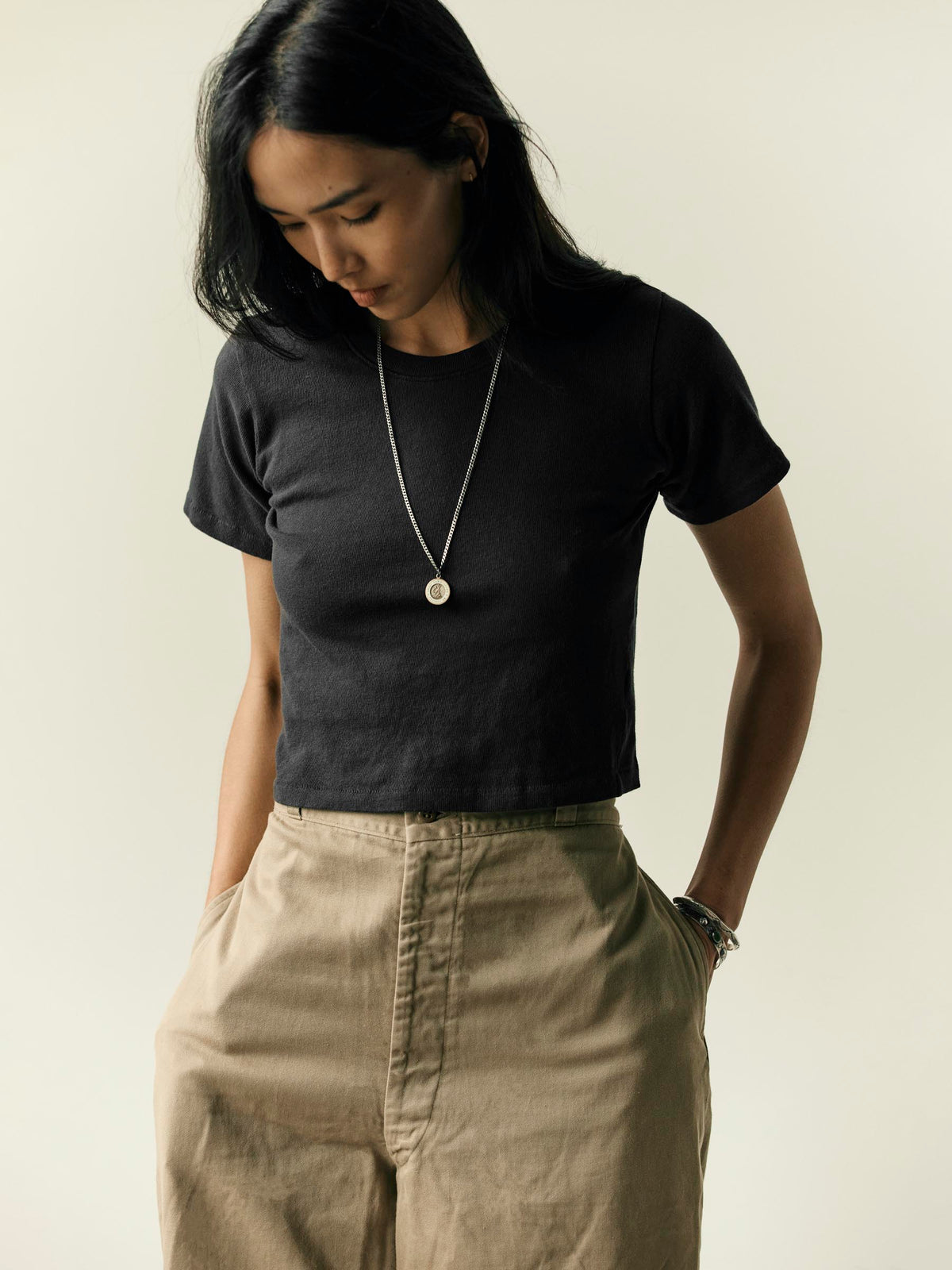 the baby tee in faded black