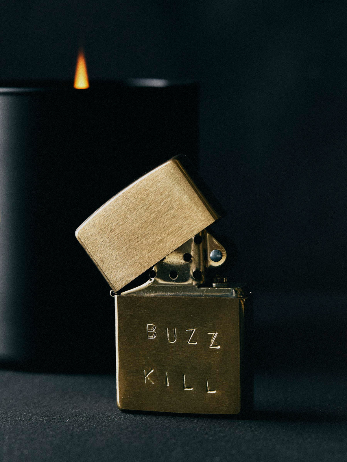 hand stamped “buzz kill” zippo