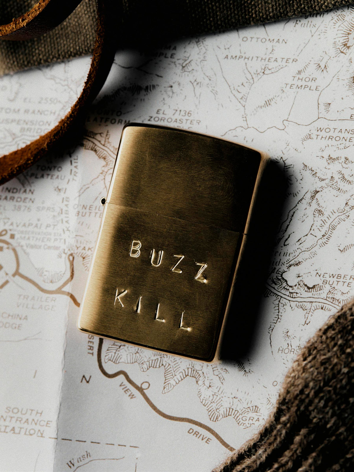 hand stamped “buzz kill” zippo