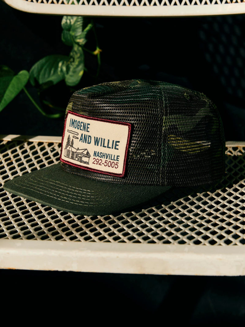 the "service station" mesh trucker in camo
