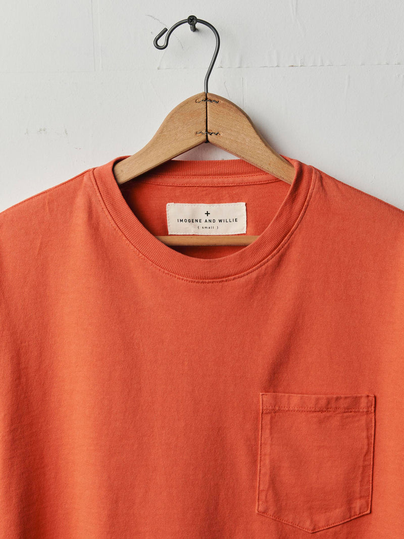 long sleeve pocket tee in faded orange - Model
