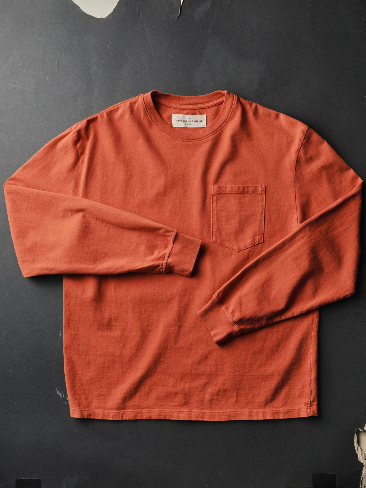 long sleeve pocket tee in faded orange
