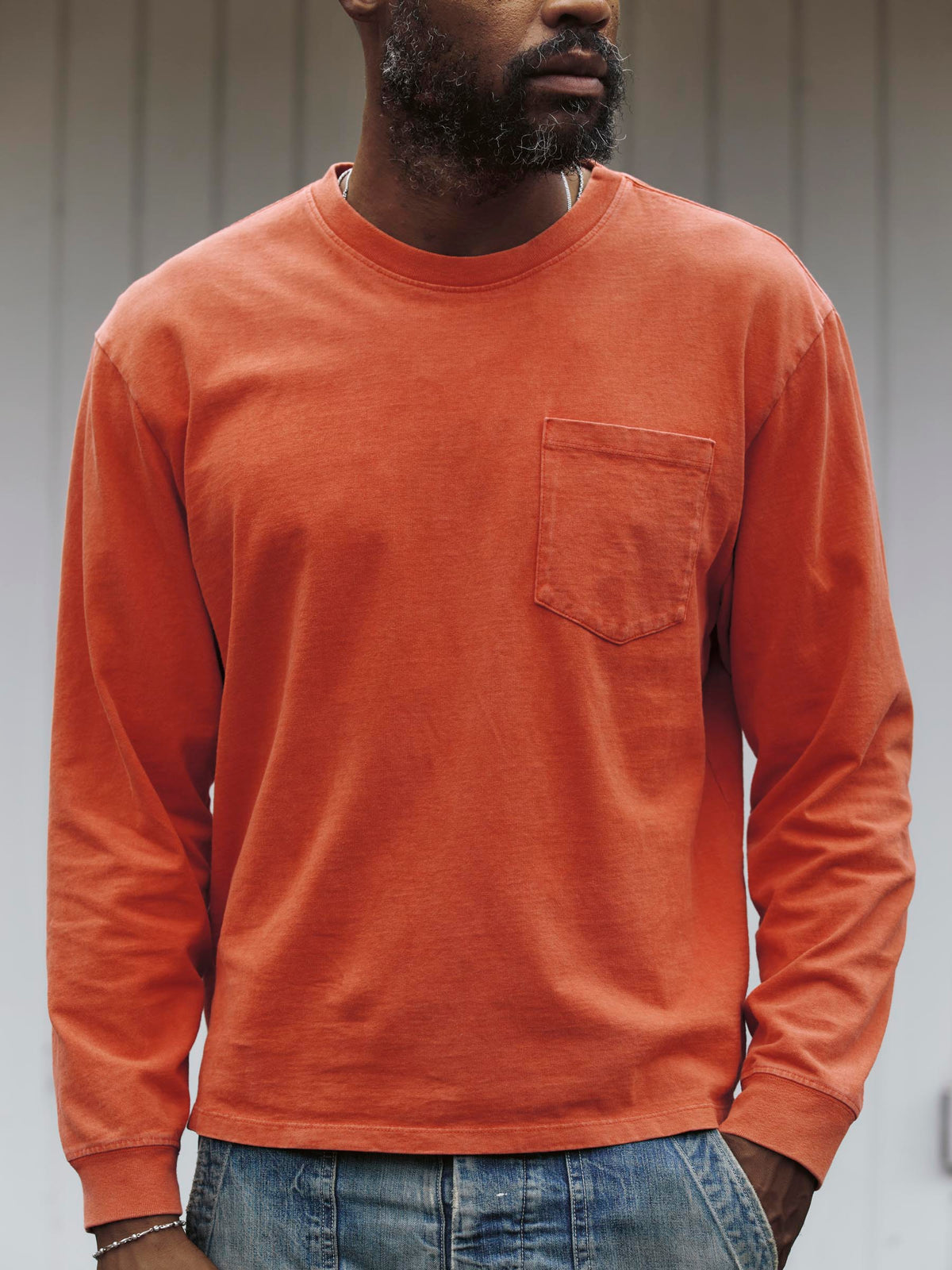 long sleeve pocket tee in faded orange