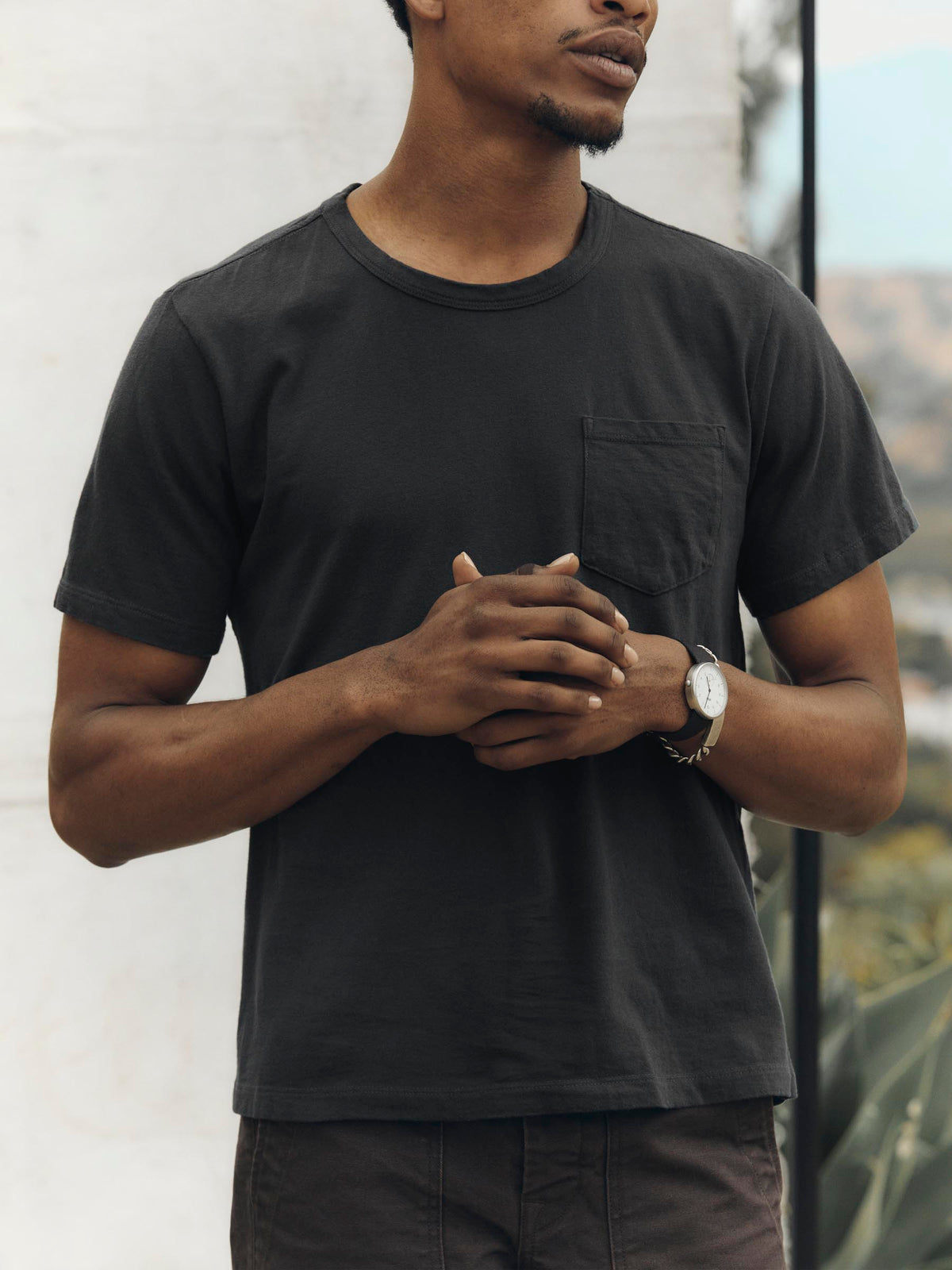 faded black knit pocket tee